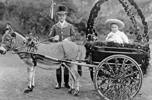 Attendants: Coachman with carriage and child, 1912