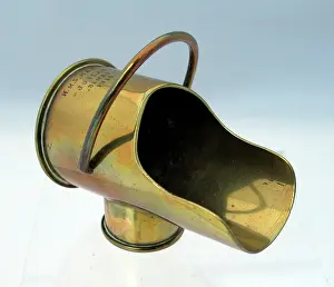 Maenad: A coal-scuttle made from two types of shell cases