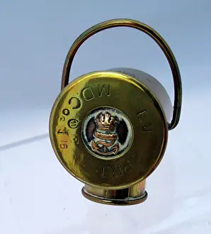 Maenad: A coal-scuttle made from two types of shell cases