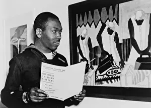 Racially: Coast Guardsman Jacob Lawrence, with his paintings