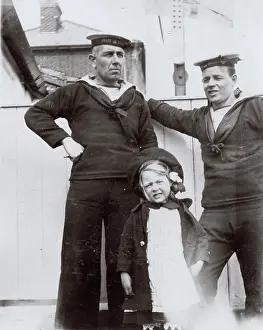 Southwold: Two coastguards and a little girl