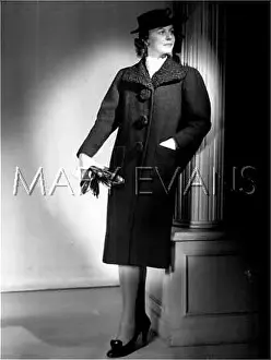 Loosely: COAT WITH BIG BUTTONS