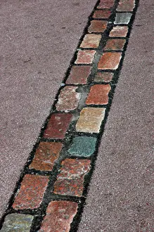 Cobblestones: Cobblestones line that marks the place where was the Berlin