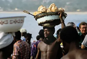 Freetown: Coconut seller, Sierra Leone