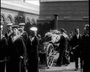 Ratings: A Coffin Covered in a Union Flag and A Wreath