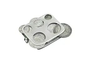 Dispenser: Coin holder and dispenser