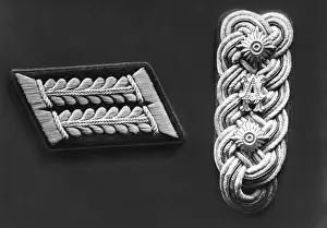Attorney: Collar patch and shoulder mark of a military lawyer