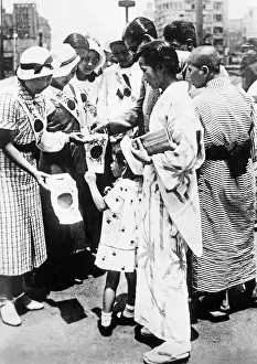 Donate: Collecting war donations in Tokyo, 1937