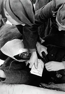 Medics: Collection point for wounded soldiers, 1943