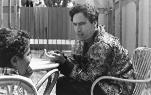 Shirts: Colonel Gaddafi with his son at home, Tripoli