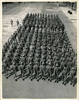 Dependent: Colonial Coronation contingent parading at Woolwich, London