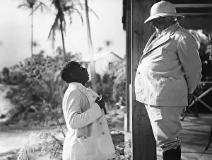 Moviestill: Colonial master in a film in the 1930s
