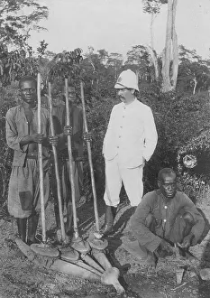 Blacksmith: Colonial official with blacks in the Belgian colony of Congo