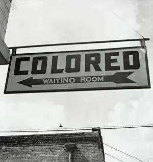 No One: COLORED WAITING ROOM sign hangs at the Memphis