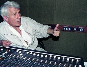 Darkest: Colour photo of Antony Thomas at a mixing desk