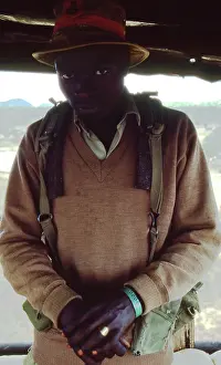 Zanu: Colour photo of guard in gun tower at a protected