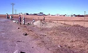 Transkei: Colour photo of kraals and people at the side
