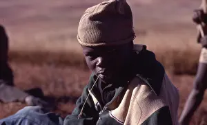 Transkei: Colour photo of young man with blade of grass