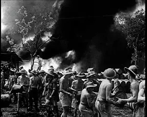 Emitting: Commonwealth Troops Watching Flames and Smoke