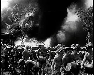 Emitting: Commonwealth Troops Watching Flames and Smoke