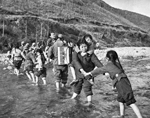Henan: Communist China - communication team in water