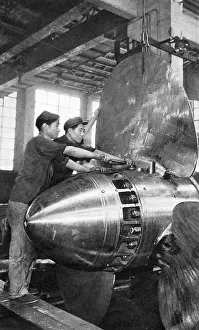 Nozzle: Communist China - shipbuilding yard workers