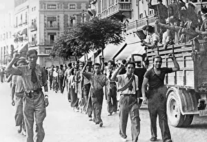 Greeted: Communist militia marching through Valencia, 1936