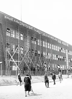 Ladders: Communist slogans on a house facade, circa 1920s