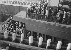 Lcgr2016: Commuters on a ferry entering a slip, 1915-20