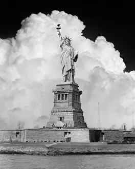 Classic Stock: Composite Image of Statue of Liberty with Dramatic
