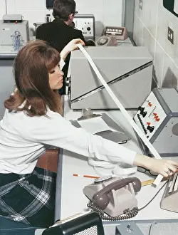 Tape: A computer technician with data tape