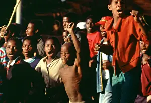 Amandla: Comrades. Children protesting, singing and dancing