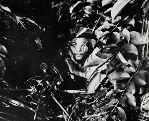 Gunner: Concealed machine gun position in the jungle