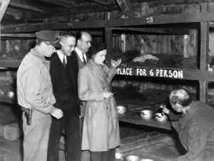 Bunks: A concentration camp prisoner (right) shows ?