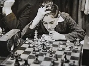 Chessboard: Concentration of a young chess player