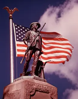 Minuteman: Concord Minuteman of 1775 Statue with American Flag Again