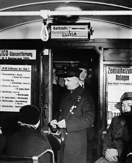 Cost: Conductor in a tram, 1934