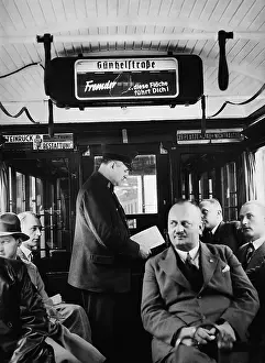 Similarly: Conductor in a tram, 1935