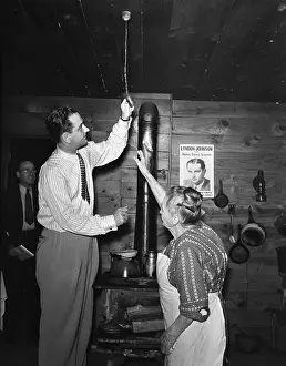 Electrification: Congressman Lyndon Johnson examines Mrs. ?