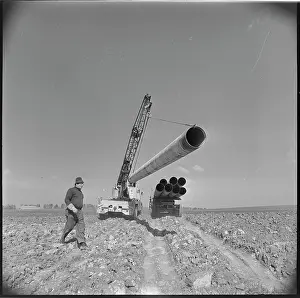 Compressor: Construction, crane, pipe, pipe, truck, worker, trench