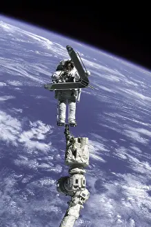 Weightless: Construction work on International Space ?