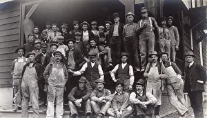 Braces: Construction workers outside a large building, USA