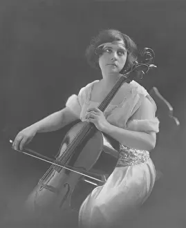 Classy: Contemplating woman plays cello
