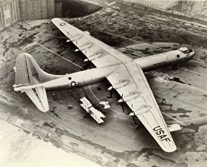Convair: Convair B-36D and a Curtiss-type pusher biplane
