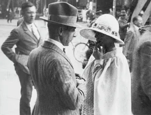 Immigration: Conversation on a street, 1920s