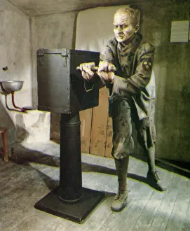 Stiff: Convict in prison cell turning hand-crank