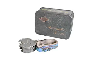 Distressed: Cook & Company automatic knotter and original tin box