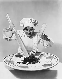 Oversize: Cook with giant plate and cutlery