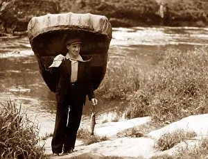 Coracle: Coracle on River Teifi at Cenarth, Wales probably 1930s