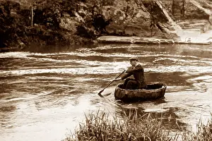 Coracle: Coracle on River Teifi at Cenarth, Wales probably 1930s